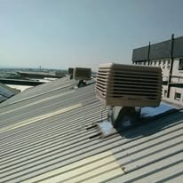 Breezair TBQ550 evaporative cooler installed