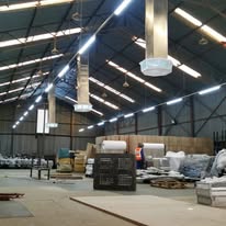 Breezair TBQ550 evaporative cooler with plenum diffuser installed