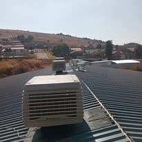 Breezair TBQ550 evaporative cooler installed