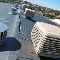 Breezair TBQ550 evaporative cooler with Cyclovent turbine ventilator installed