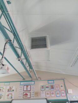 Breezair TBQ550 evaporative cooler with ceiling grills installed