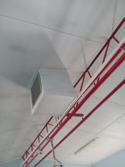 Breezair TBQ550 evaporative cooler with ceiling grills installed